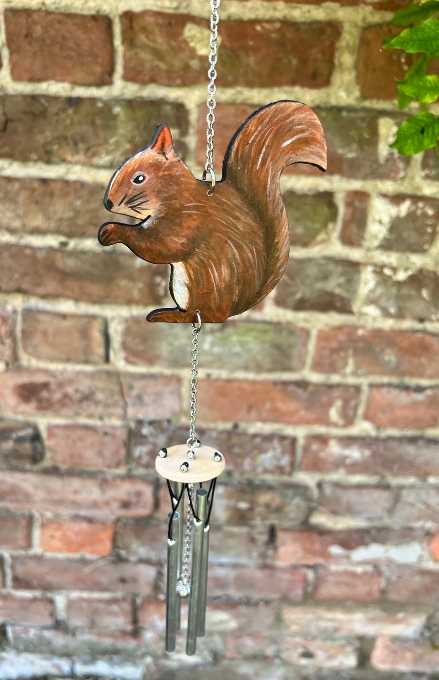 Red squirrel wind chime with aluminum chimes and a metal acorn striker 