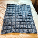 Crocheted patchwork baby blanket
