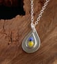 Layered teardrop pendant with blue and yellow glass detail