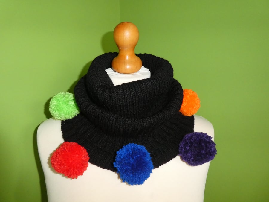 Rainbow Pom Pom Cowl. Ribbed Cowl In Black with Rainbow Pompom Trim.