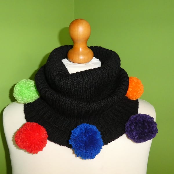 Rainbow Pom Pom Cowl. Ribbed Cowl In Black with Rainbow Pompom Trim.