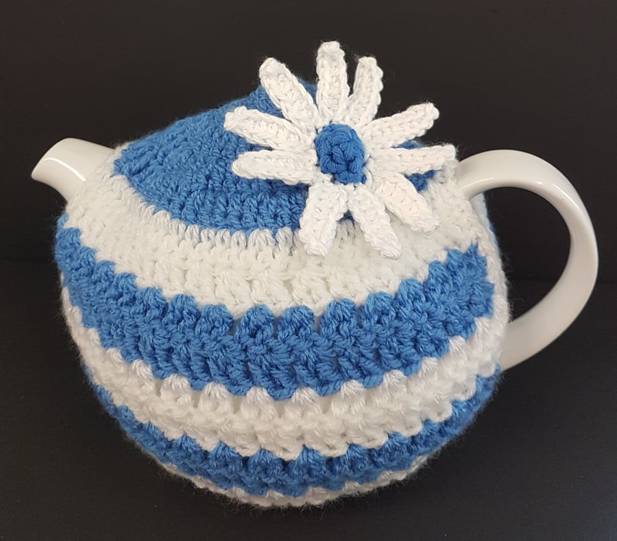 Blue & White stripe tea cosy with flower.