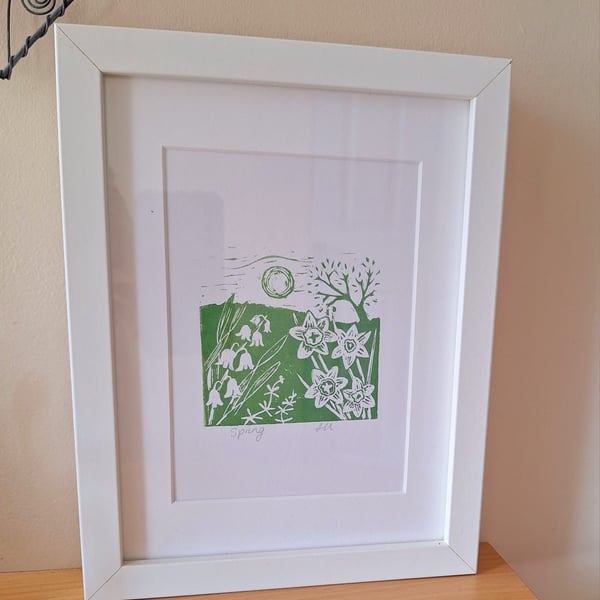 An original handprinted linoprint of a spring scene. 'Spring'.