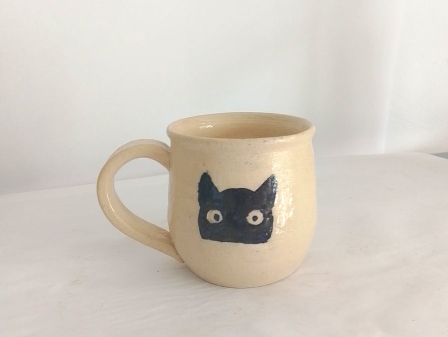 Quirky humerous black Cat mug, hand made pottery white funny Cat mug