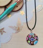 Colourful circular hand painted wooden necklace 