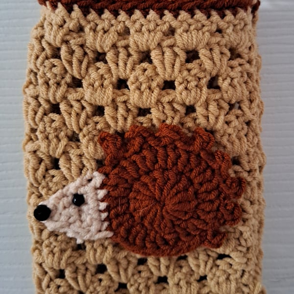 Crocheted hedgehog mobile phone holder