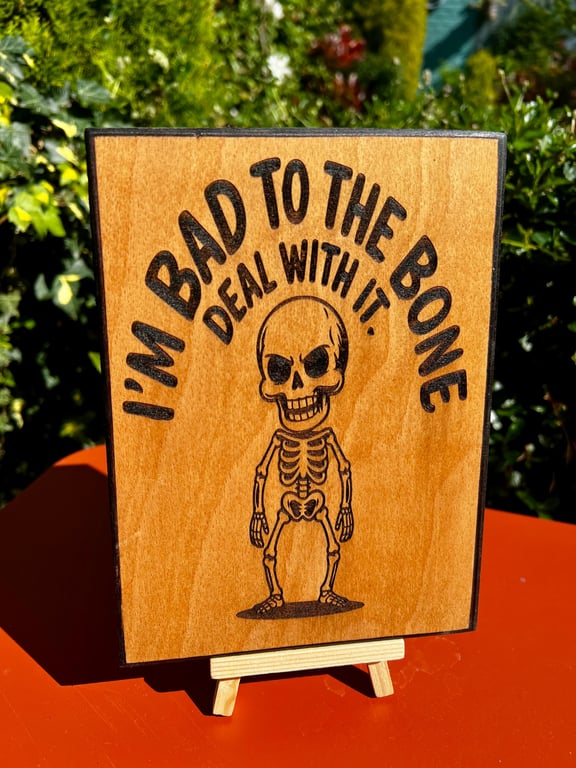 Quirky skeleton wooden plaque 