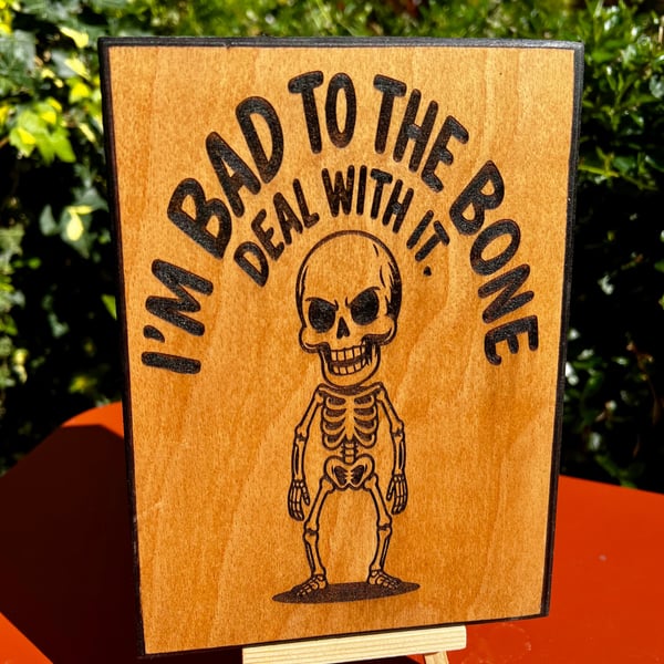 Quirky skeleton wooden plaque 
