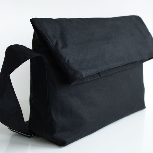 Minimal fold top bag in black waxed canvas by Minus