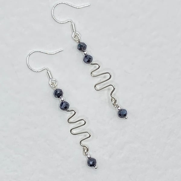 Squiggle drop earrings with faceted spinel stones 