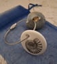 Pebble keyring with an ammonite fossil image - Image 2