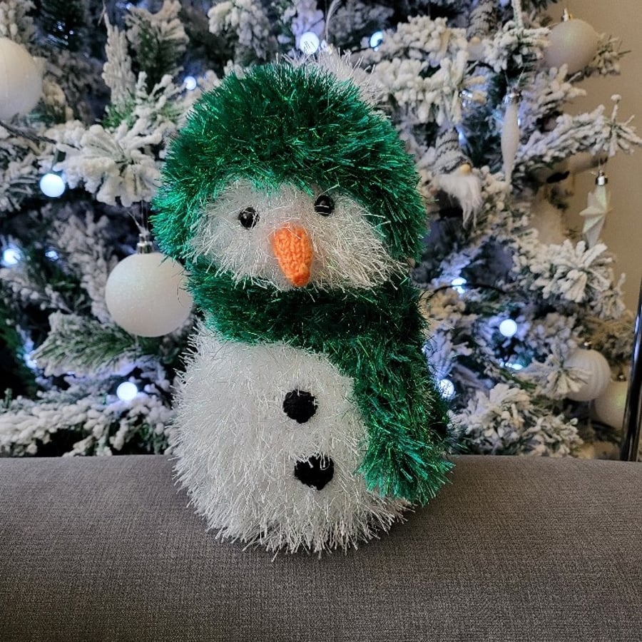 Snowman with green & white hat and scarf hand knitted and perfect for Christmas