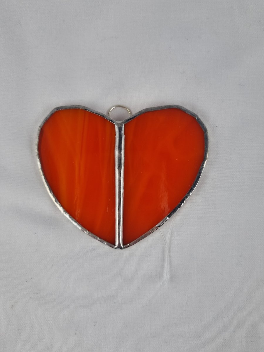 588 Stained glass small Two piece orange heart - handmade hanging decoration.