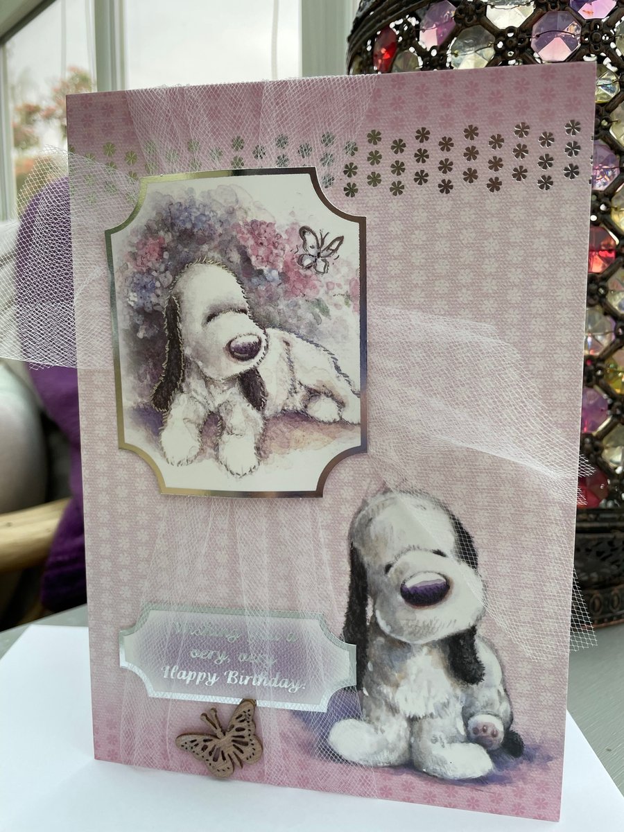 Cute dog and butterfly Happy birthday card