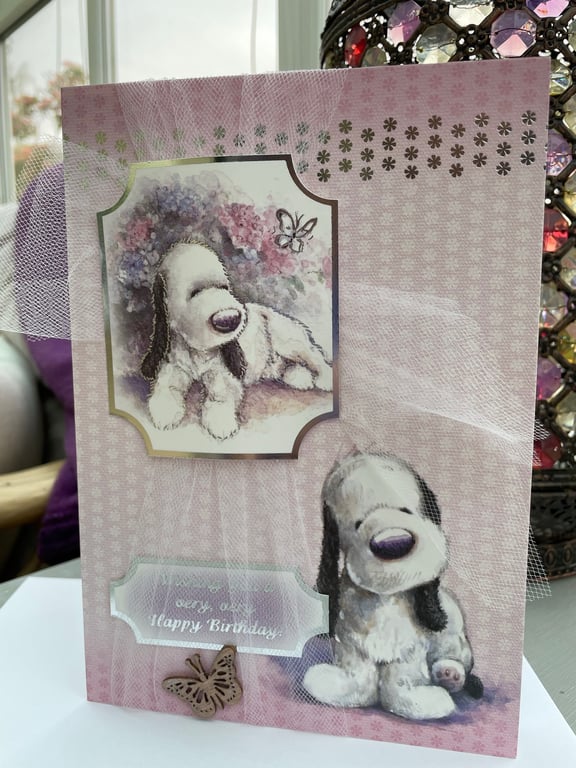 Cute dog and butterfly Happy birthday card