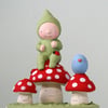Sweet little Folk art pixie sculpture on toadstool
