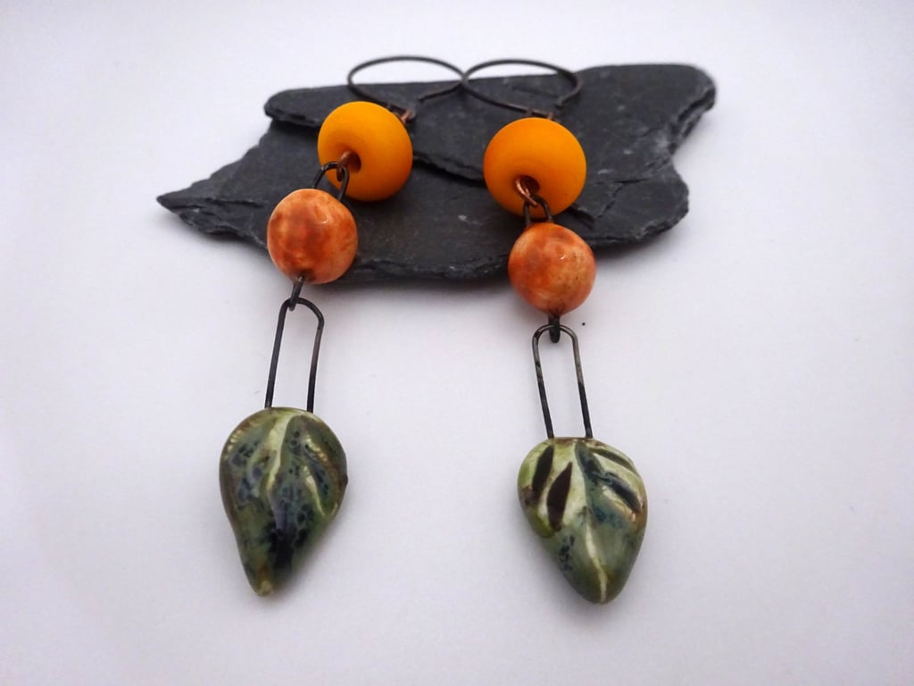orange and green leaf ceramic earrings