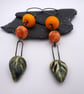 orange and green leaf ceramic earrings - Image 1