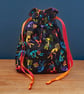 Small Sized Rainbow Kokopelli Style Reusable Gift And Storage Bag - Image 1