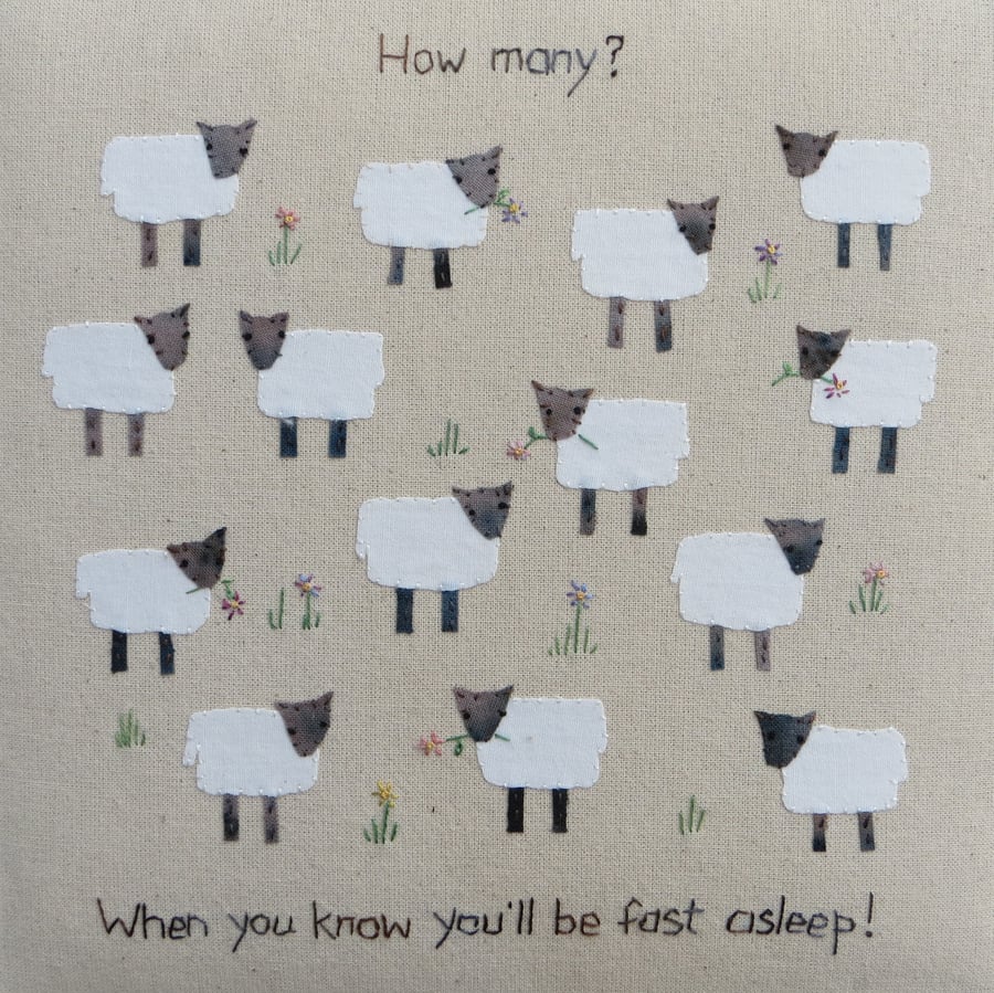 How Many? Hand-stitched words and lots of applique sheep to count!