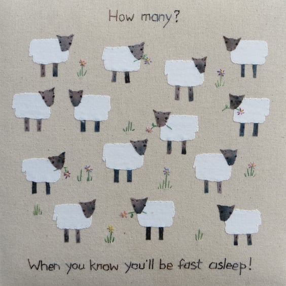 How Many? Hand-stitched words and lots of applique sheep to count!