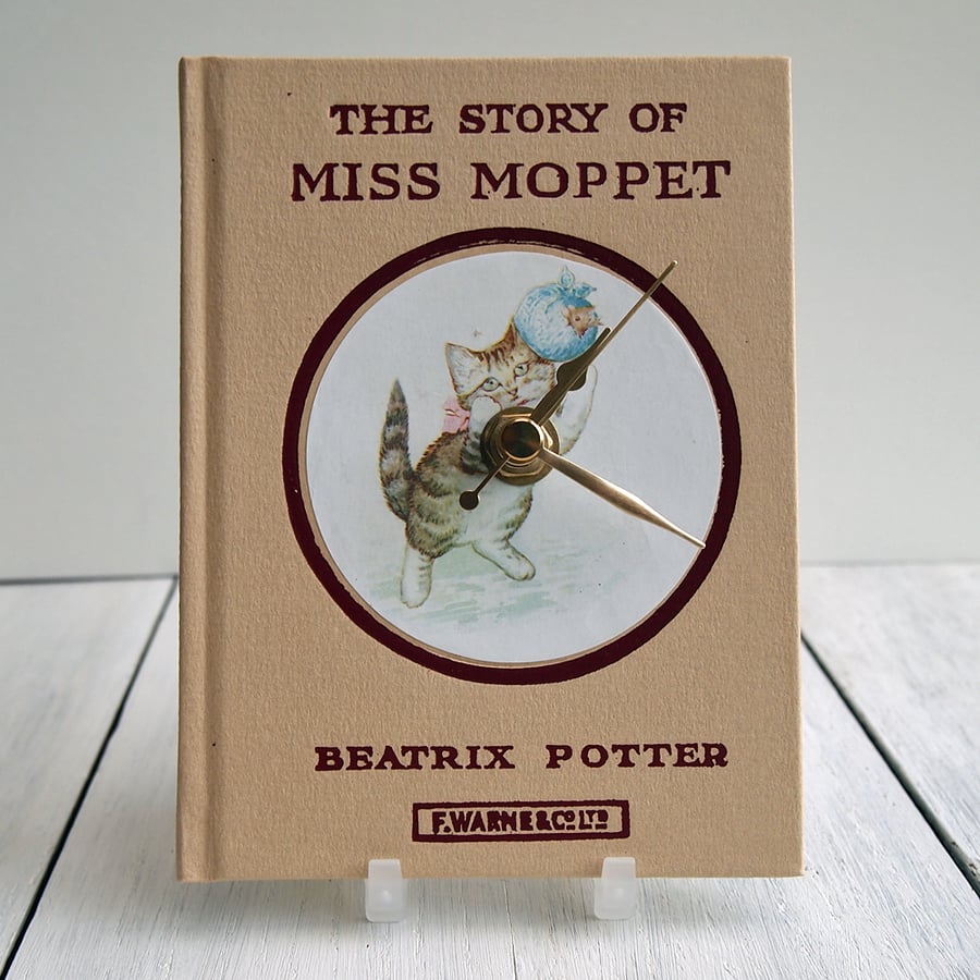 The Story of Miss Moppet by Beatrix Potter book clock.  