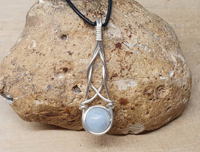 Celtic knot Aquamarine pendant. Wire wrapped neckace. March Birthstone.