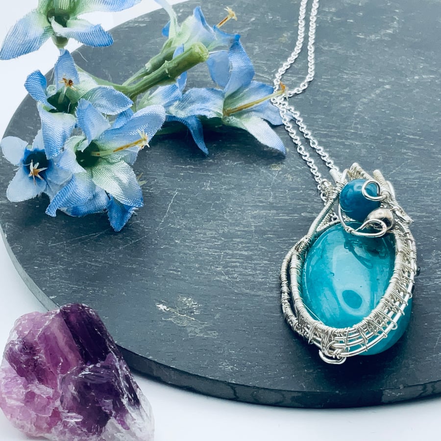 Wonderful deep aqua silver plated wire wrapped agate pendant