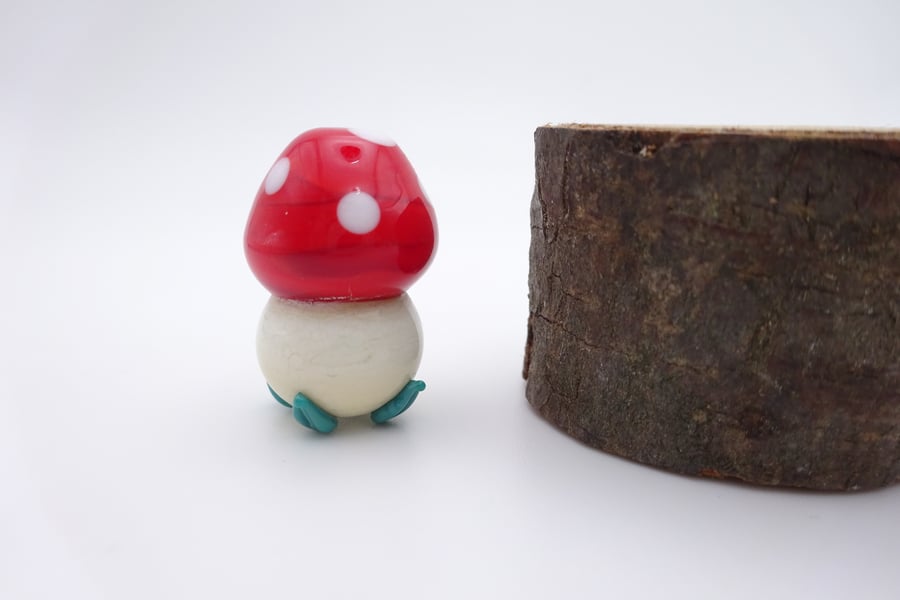 small glass toadstool house