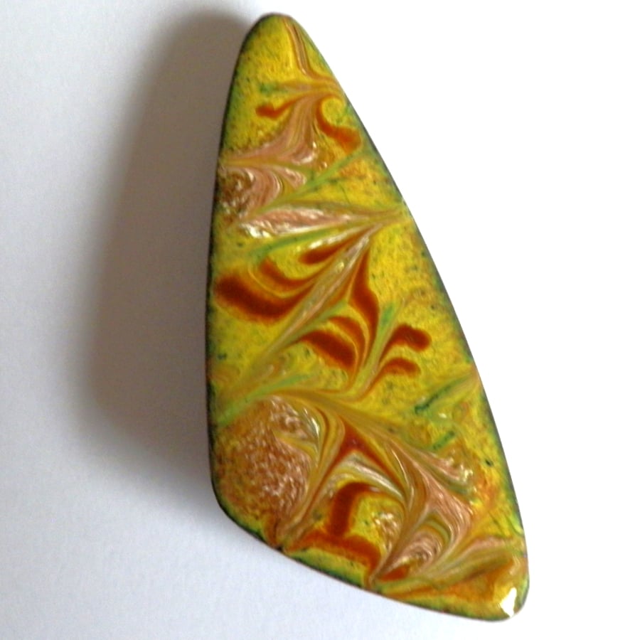 brooch - triangle scrolled white and brick red over yellow