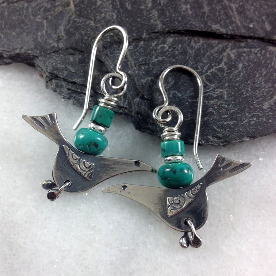 silver bird earrings with  turquoise.