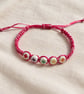 Children's Pink Macramé Bracelet with Colourful Flower Beads – Adjustable - Image 1