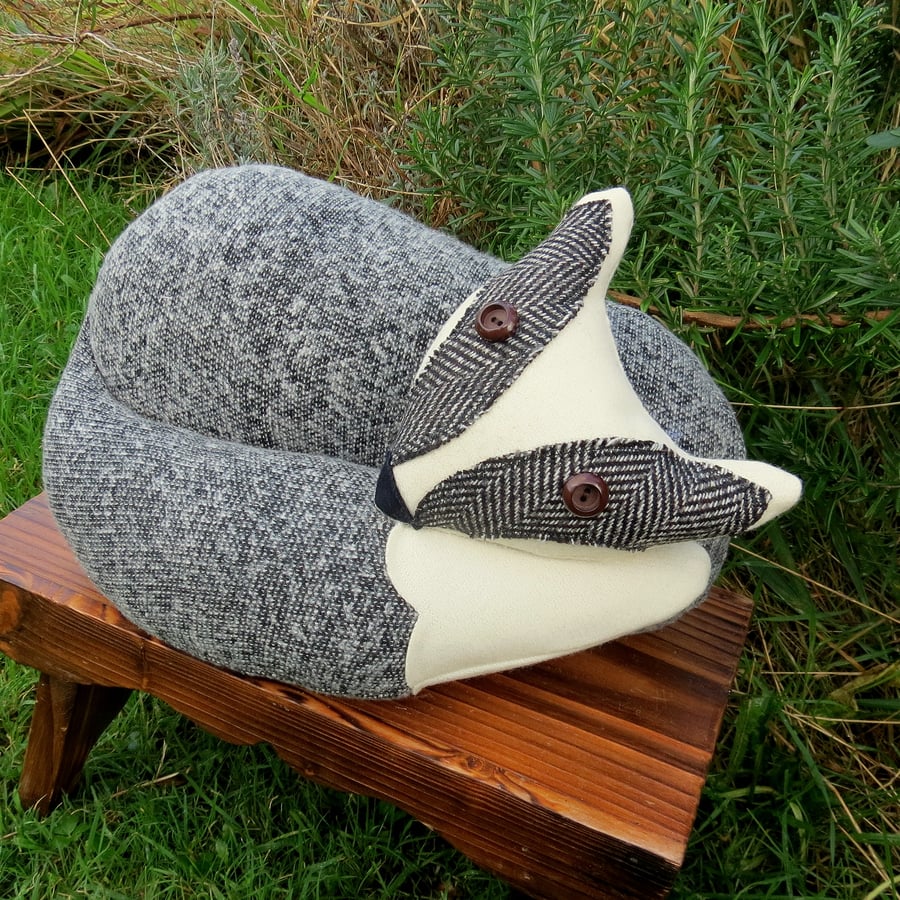 Oscar, a tactile badger cub cushion.