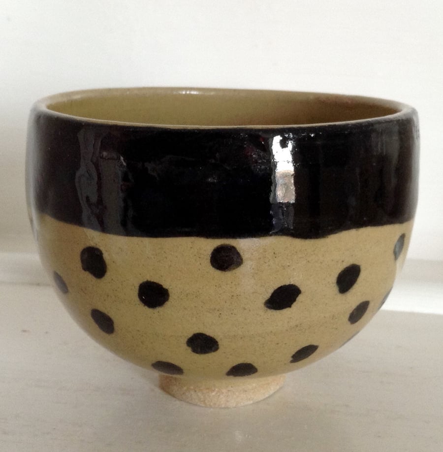 Bowl with black and cream spotted decoration