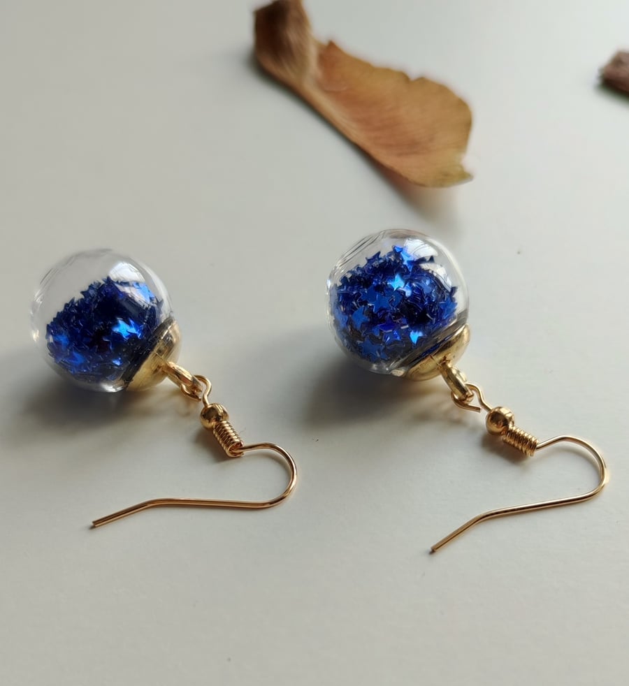 Blue star sequin glass bauble earrings