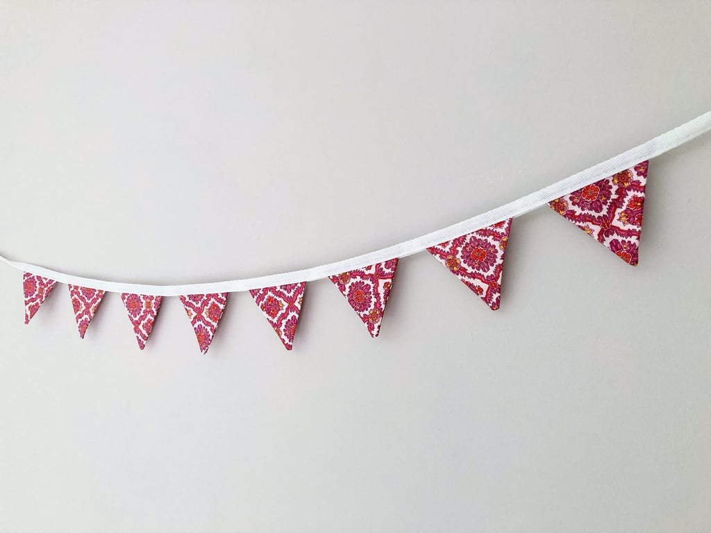 Pink and white patterned mini bunting. Double sided fabric.