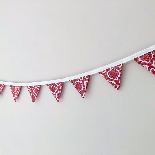 Pink and white patterned mini bunting. Double sided fabric.