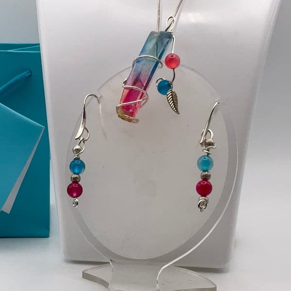 A delightful tiny pink and blue gemstone point pendant with matching earrings