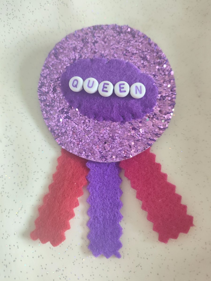 Purple sparkly handmade Queen rosette
