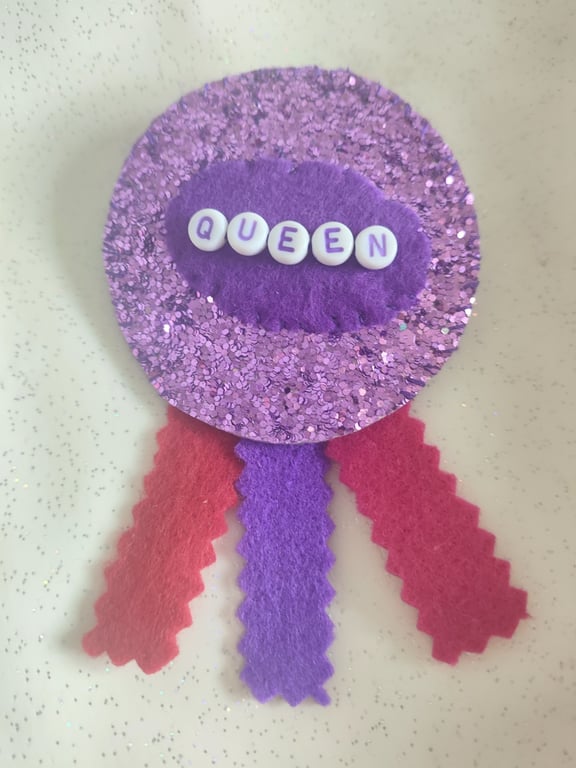 Purple sparkly handmade Queen rosette