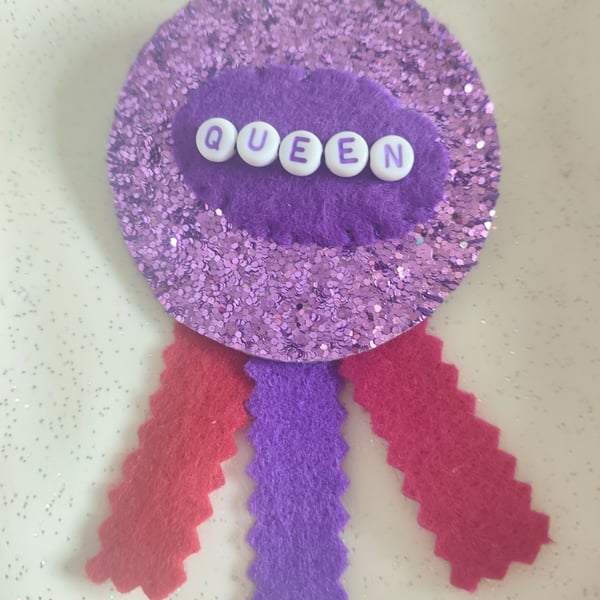 Purple sparkly handmade Queen rosette