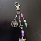 Cottagecore dragonfly and tree of life bag charm with green and purple beads