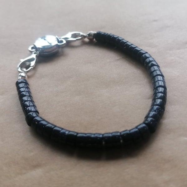 Starry night disc bracelet, silver with a magnetic clasp. 