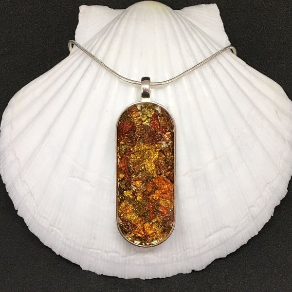 Autumn gold copper and russet metallic resin pendant and chain silver plated.