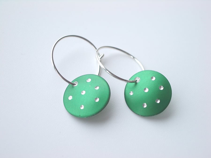 Hoop earrings with green sparkly dots