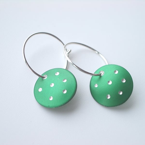 Hoop earrings with green sparkly dots