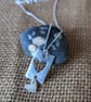 Silver pendant with heart cut out design - Image 1