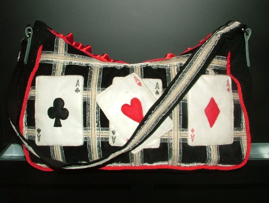 The Aces playing card ribbon handbag