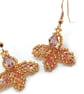 Gold tones flower petal beaded earrings
