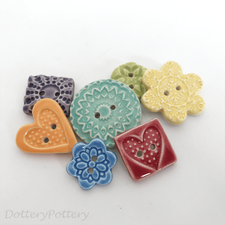 Set of seven assorted handmade ceramic buttons 